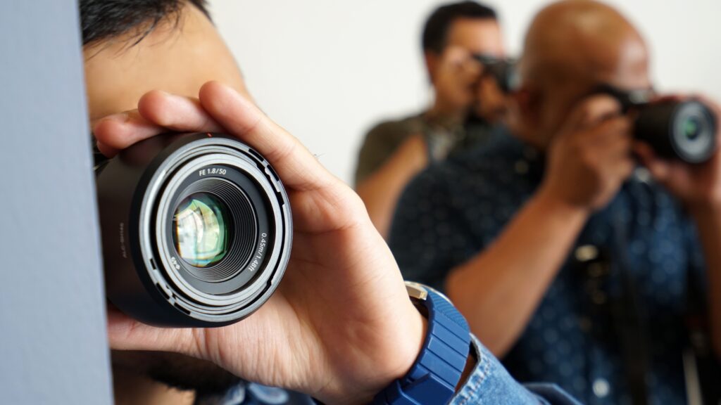 A group of men with cameras